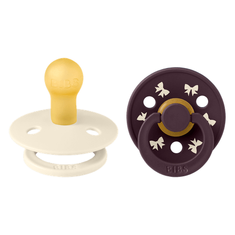 11027102_5713795272518_BIBS_Colour_2pack_rnd_LTX_S1_Bow_Ivory_Plum_2_2000x2000Highres